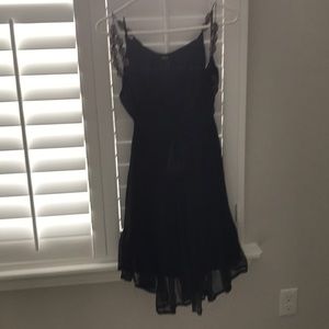 Sheer black baby doll dress with large beads